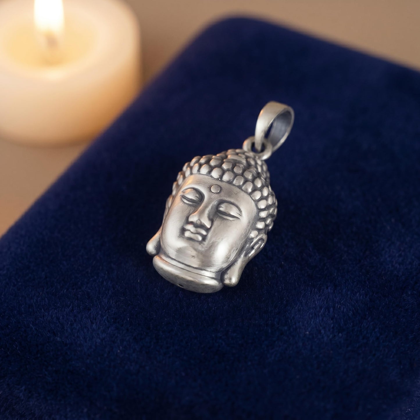 3D Buddha head pendant in silver-tone metal with loop bail