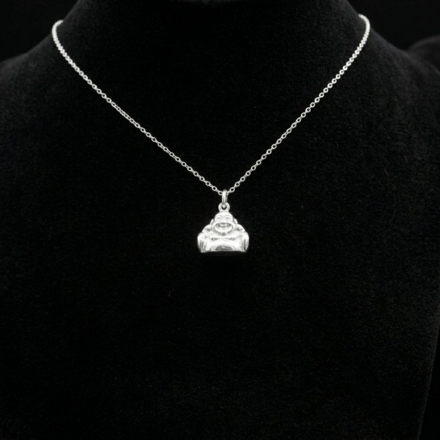 Silver chain necklace featuring a small Laughing Buddha pendant charm.