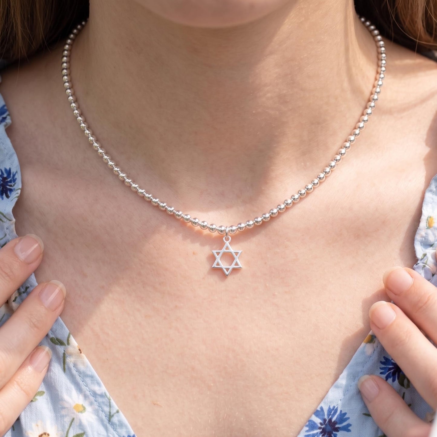 Silver beaded necklace with Star of David charm pendant