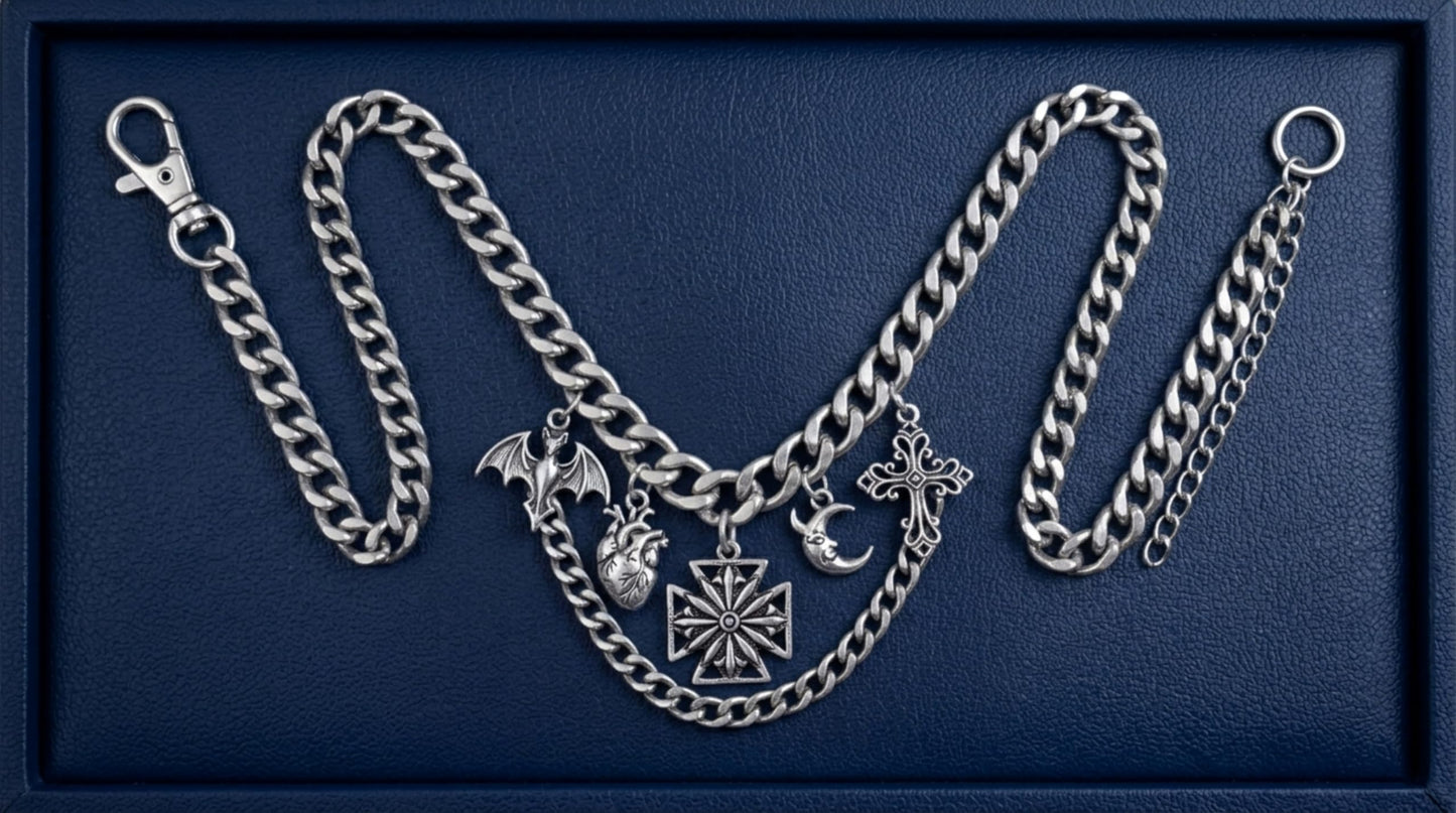 Maltese cross pendant with starburst center on a linked necklace with multiple charms