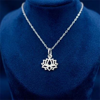 Silver-toned necklace with filigree lotus charm pendant on a short oval connector