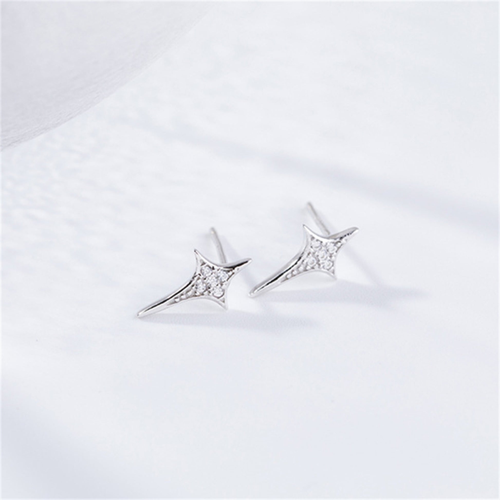 Rhodium on Sterling Silver Shiny 4 Point Pole Star Cross CZ Stud Piercing Earrings - sugarkittenlondon