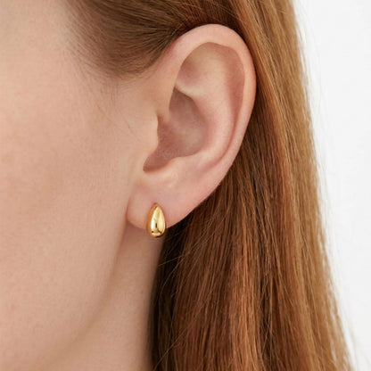 Gold teardrop stud earrings, shiny teardrop discs with small stud backs