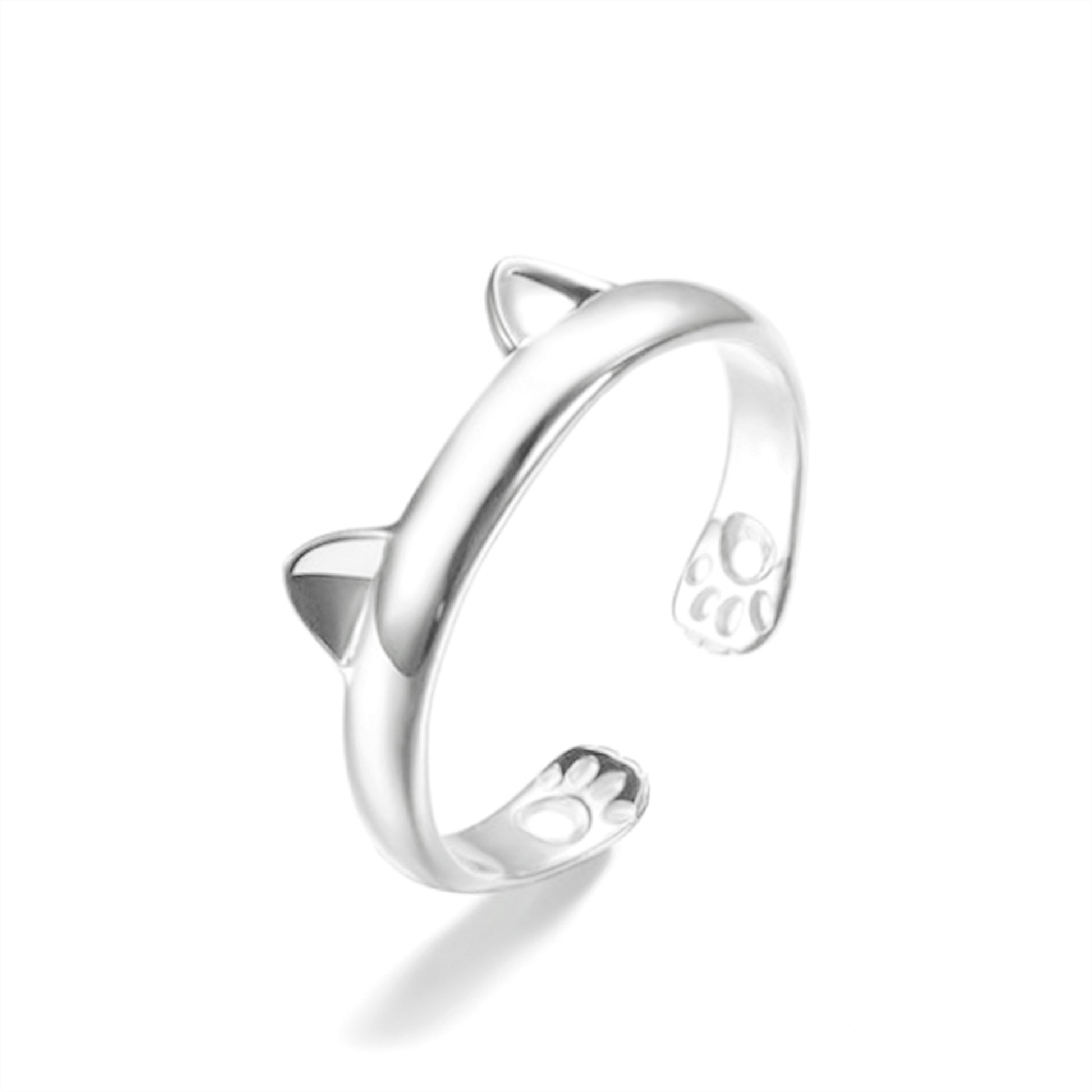 Silver-toned cat paw ring with black enamel paw details, side view