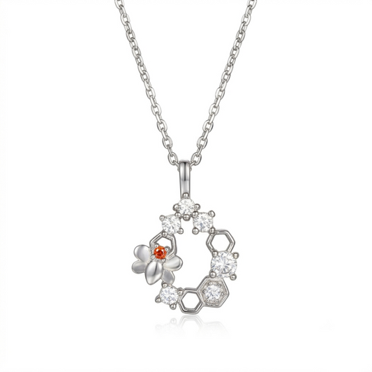 Silver-tone hexagon honeycomb necklace pendant with bee accent and clear stones