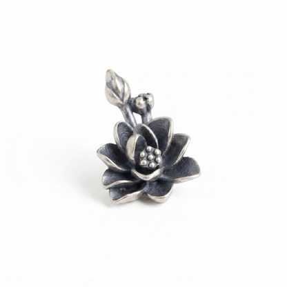 Oxidised 3D lotus charm pendant with dark layered petals and silver stem loop