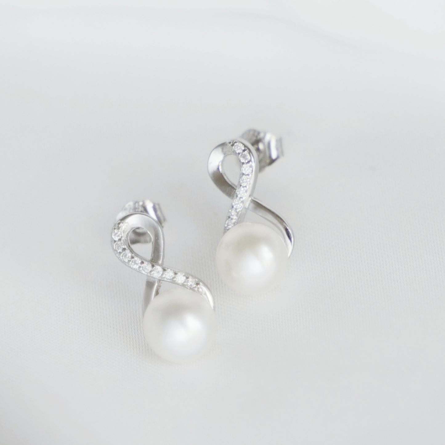 Sterling Silver Infinity Knot Natural Freshwater Pearl Stud Earrings - sugarkittenlondon