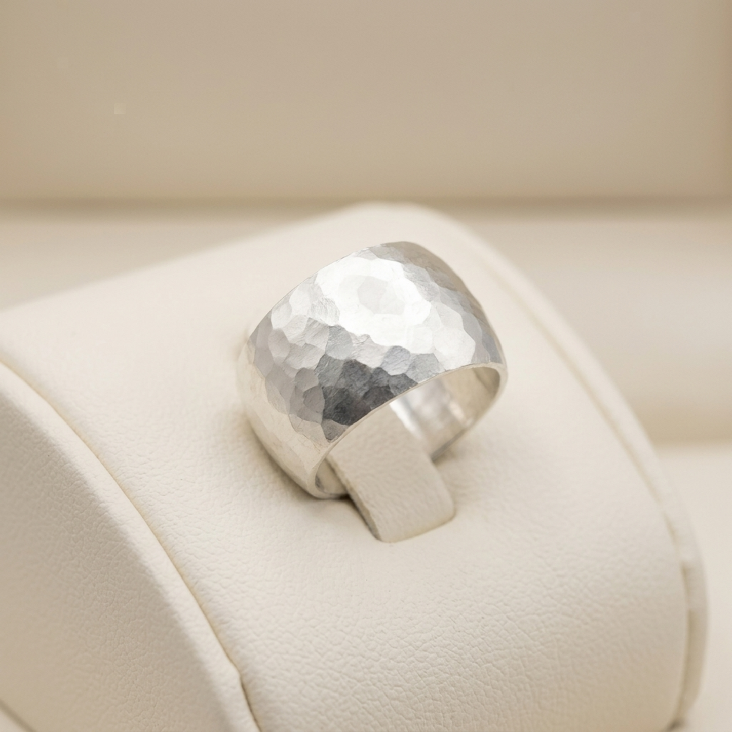 Hammered Wide Dome Ring on a smooth band: hammered dome top, wide silver profile