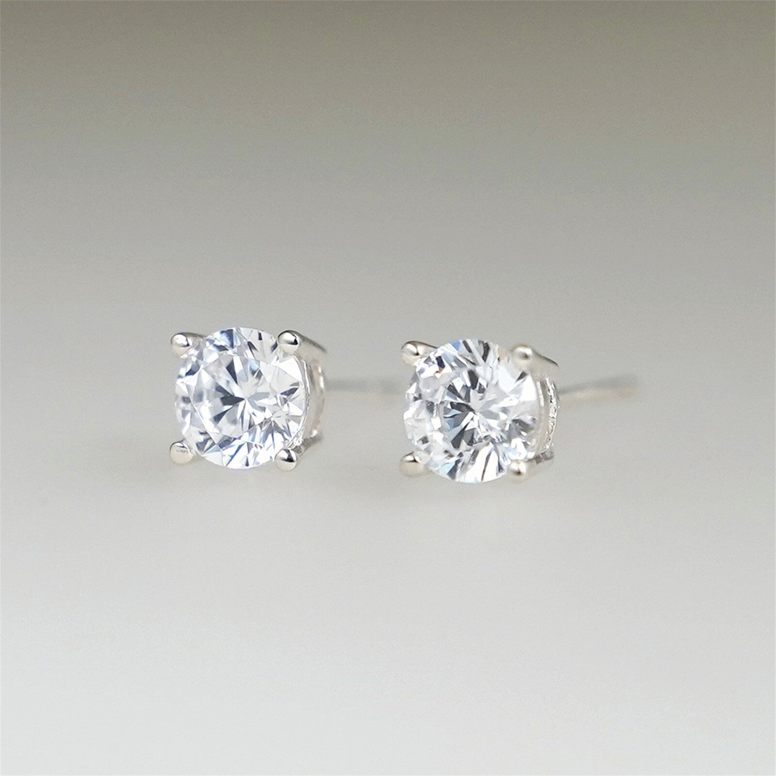 Round CZ solitaire stud earrings, clear round stones with front prong setting
