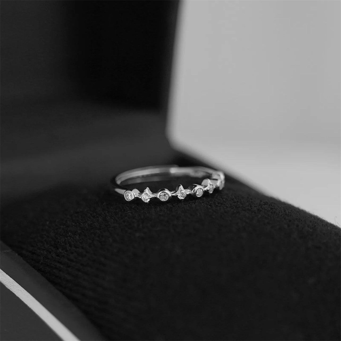 Sterling Silver Bezel-Set CZ Star Band – Adjustable Linked Ring (M–Q)