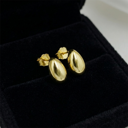 Gold teardrop stud earrings, glossy teardrop shape with post backs