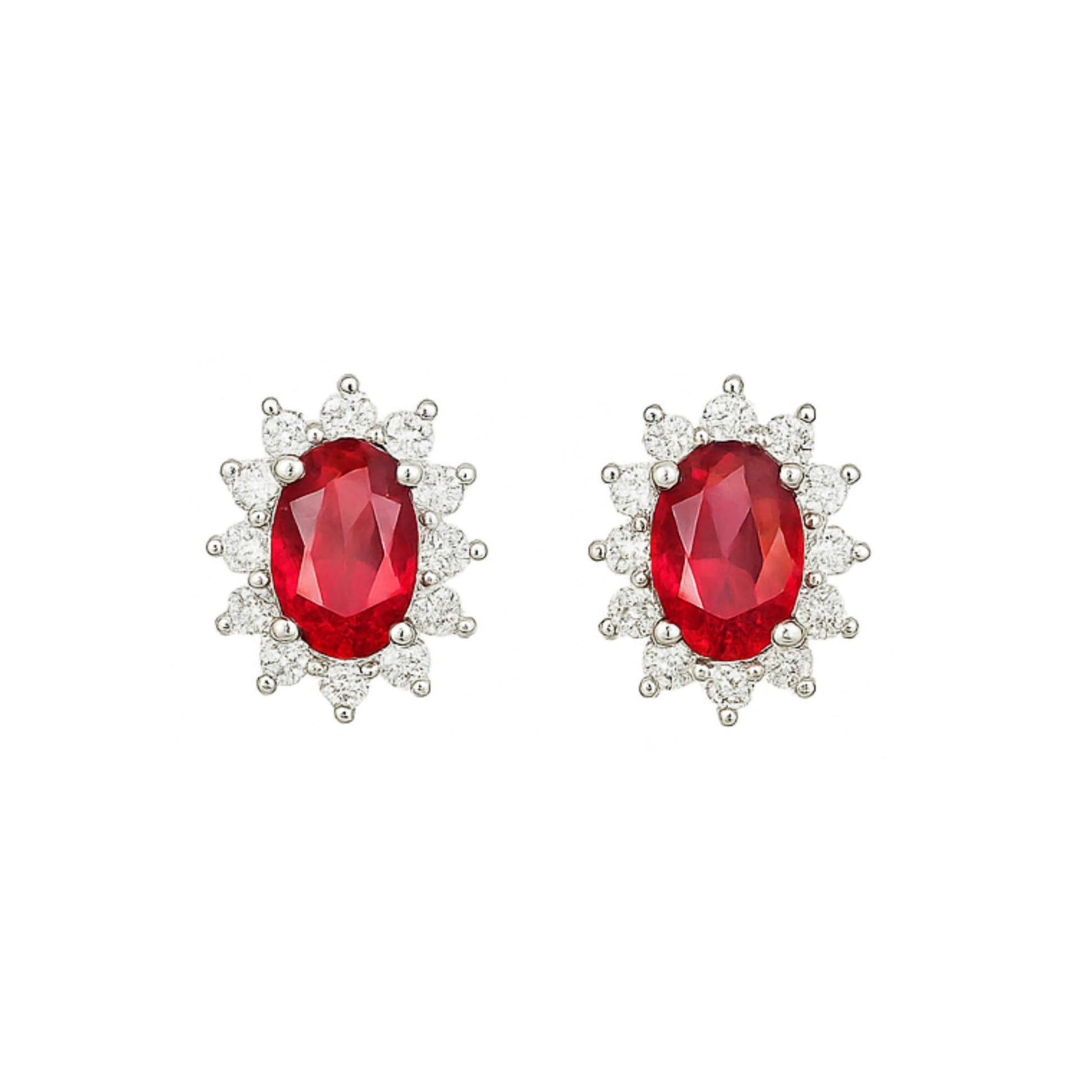 Oval ruby cluster earrings with halo of small round white stones, red gemstone, white metal