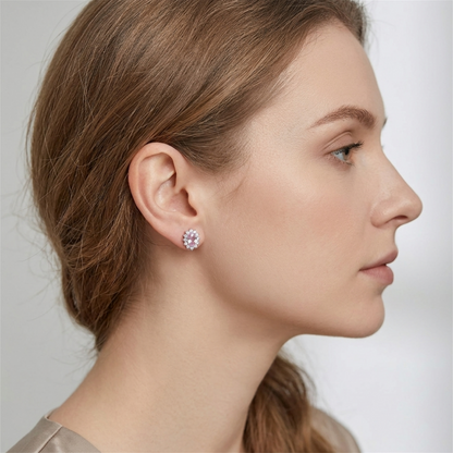 Pink oval gemstone cluster stud earrings worn on ear