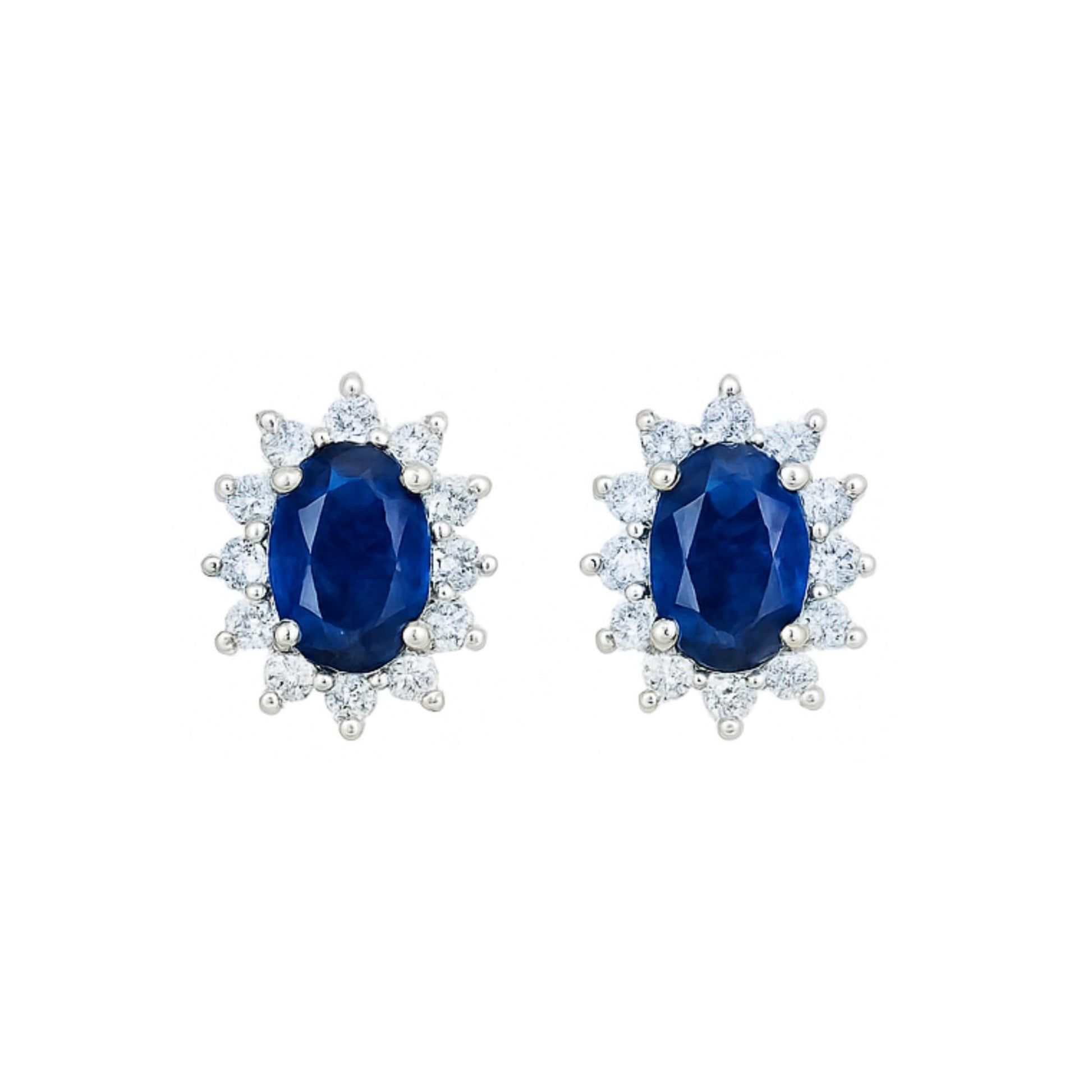 Oval sapphire cluster earrings with halo of small round white stones, white metal