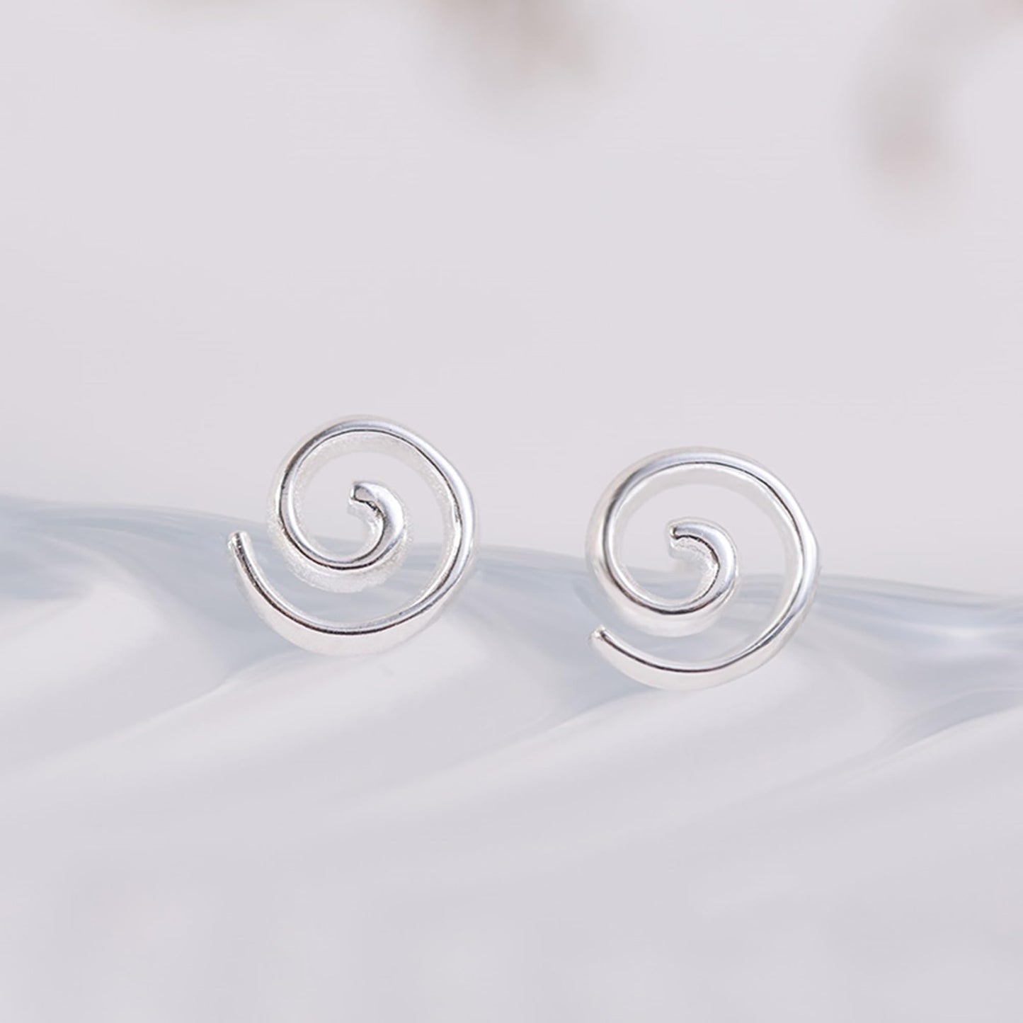 Spiral Swirl Studs earrings, smooth circular frame with inner spiral swirl