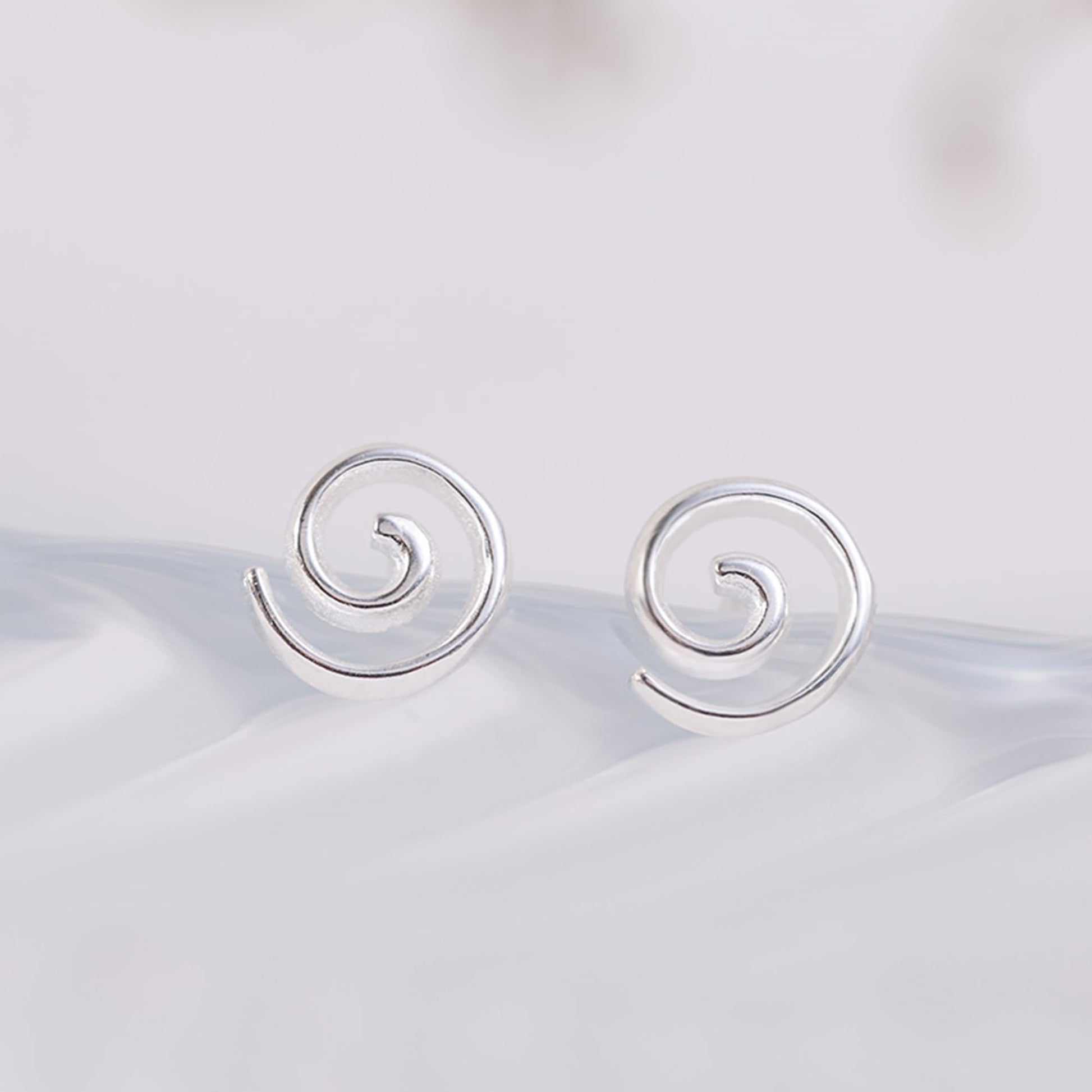 Spiral Swirl Studs earrings, smooth circular frame with inner spiral swirl