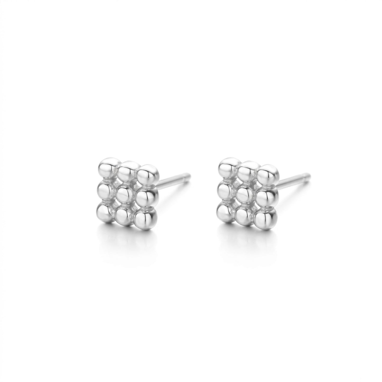 Mini geometric stud earrings, cube design with shiny silver-tone posts