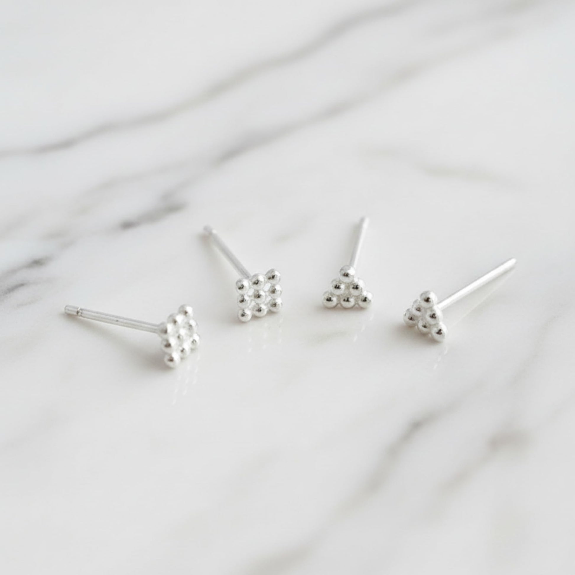 Mini geometric studs set: cube and triangle shapes on silver-tone posts