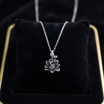 Oxidised 3D lotus pendant on chain, dark flower with silver stem and bail