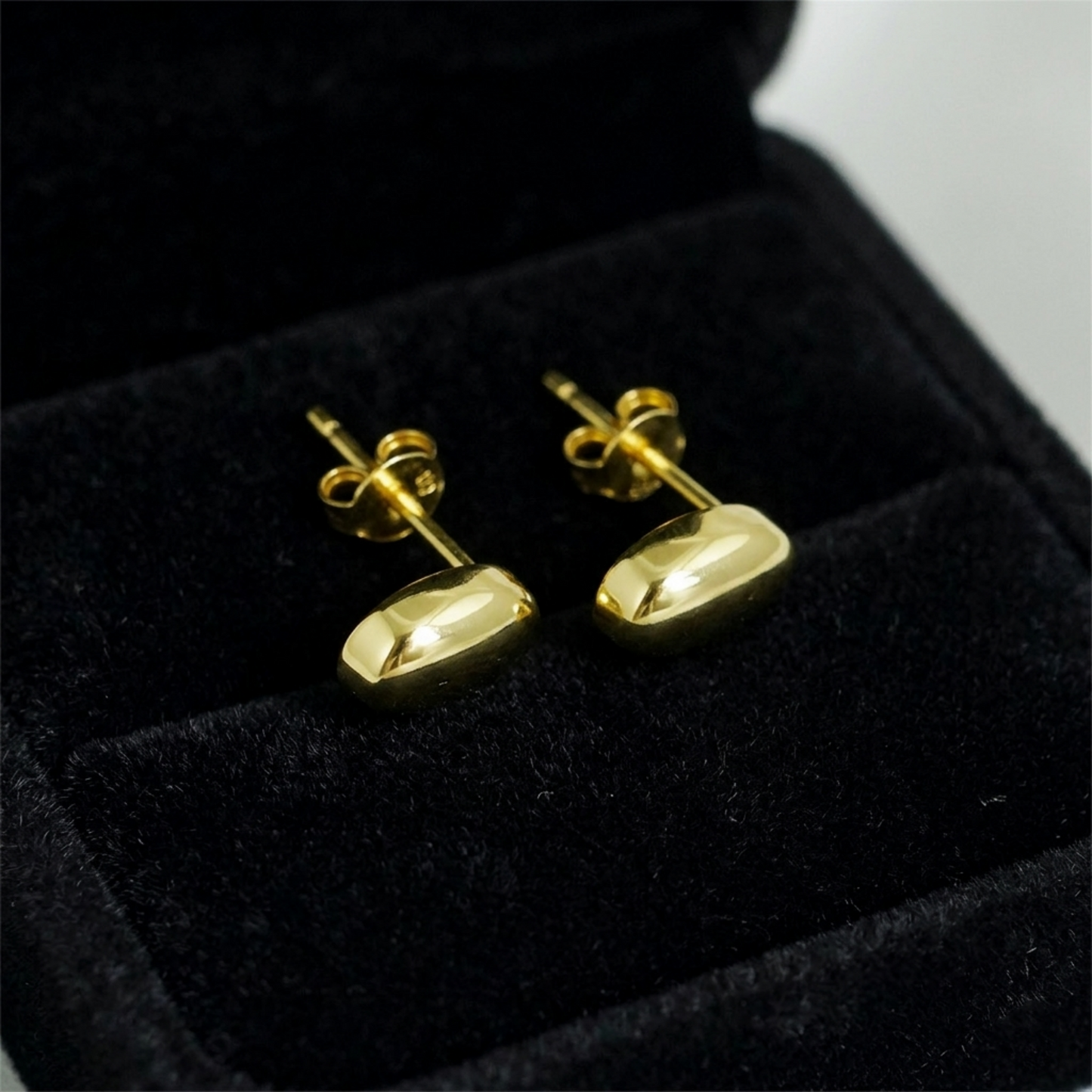 Gold teardrop stud earrings, shiny teardrop discs with secure post backs