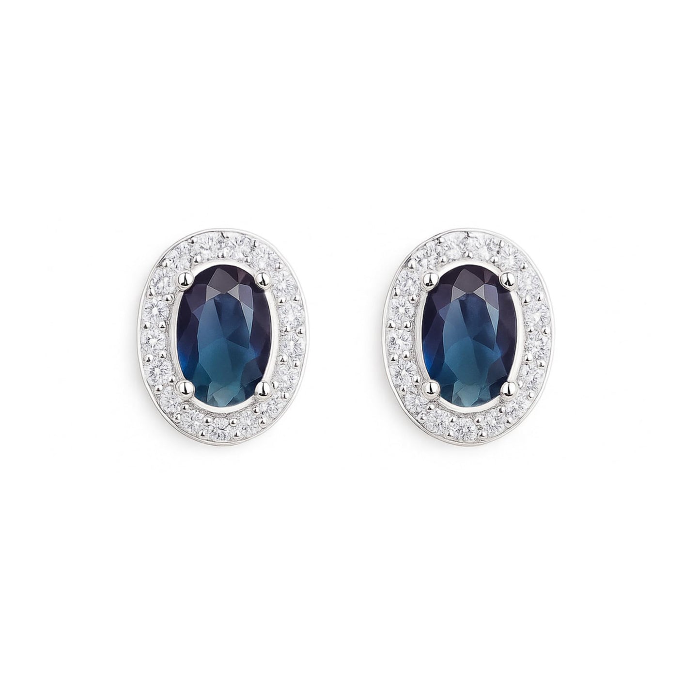 Dark blue oval CZ halo stud earrings with a clear pavé border
