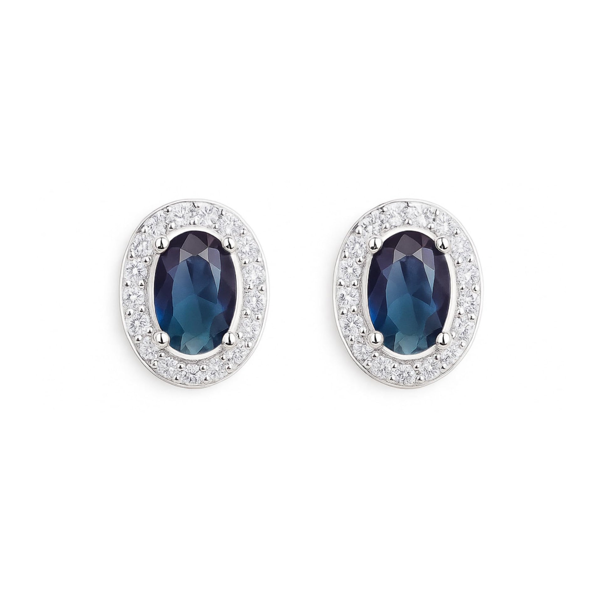 Dark blue oval CZ halo stud earrings with a clear pavé border