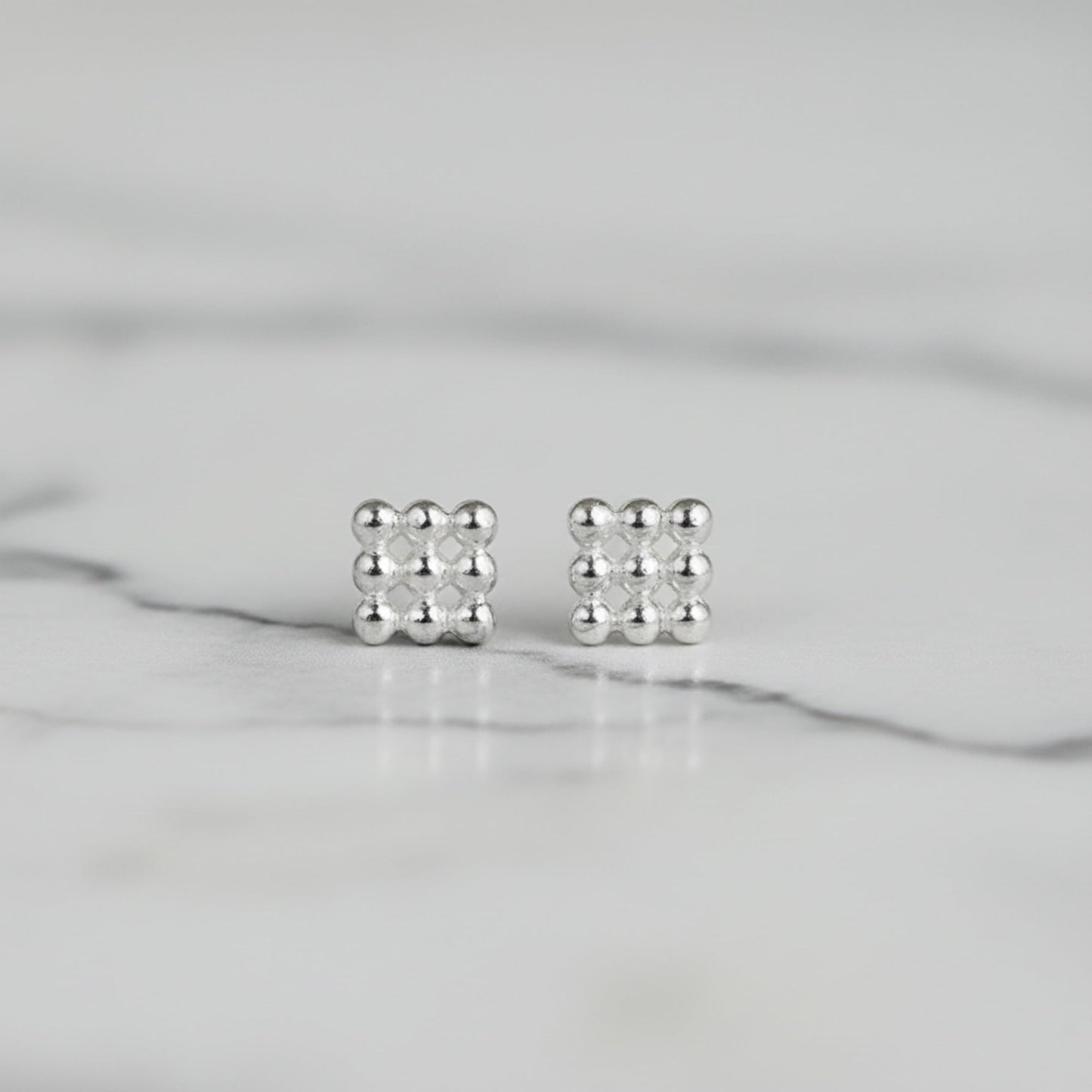 Mini geometric stud earrings, small cube pattern with polished ball setting