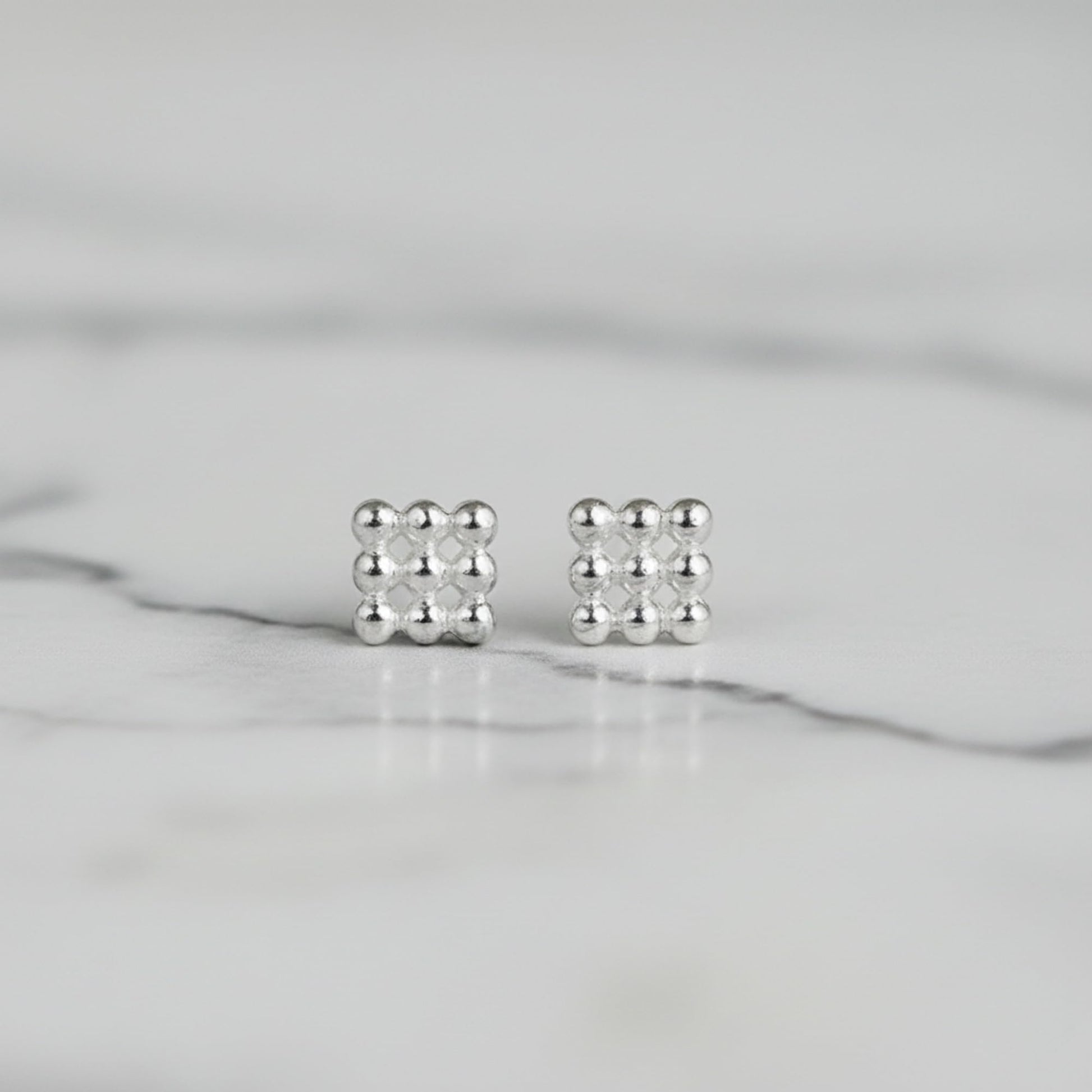 Mini geometric stud earrings, small cube pattern with polished ball setting