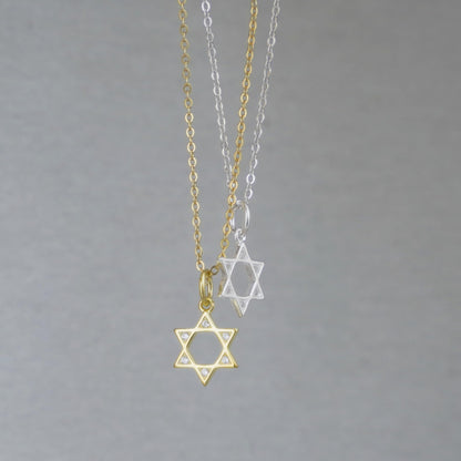 3-Tone Mixed Link Chain with star-shaped charms in gold-tone and silver-tone