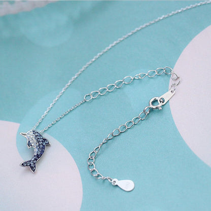 Curb extender chain with small teardrop charm and ring clasp on a linked chain