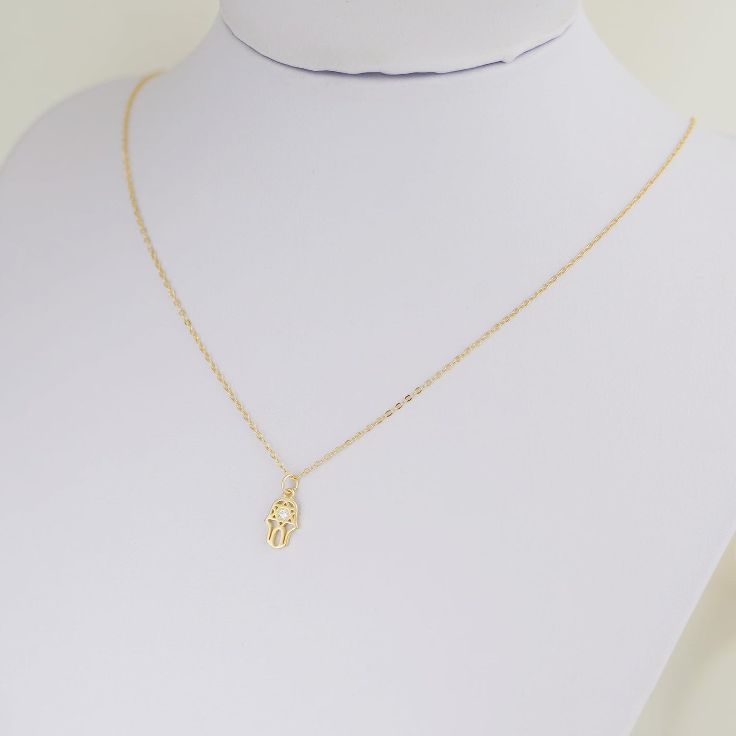 3-Tone Mixed Link Chain on necklace form with small gold-tone charm at center
