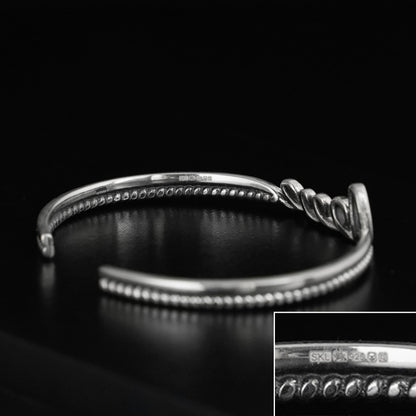 Love Knot Rope Cuff bracelet with knot clasp and textured rope edge, silver-tone
