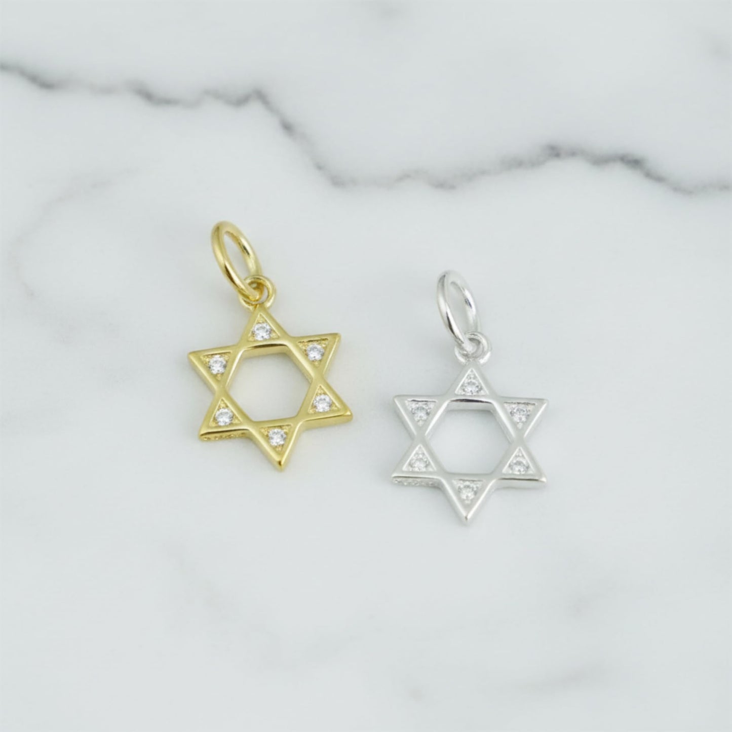 Star of David pendants, gold-tone and silver-tone hexagrams with small stone details