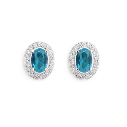 Aqua-blue oval CZ halo stud earrings in a silver-tone setting