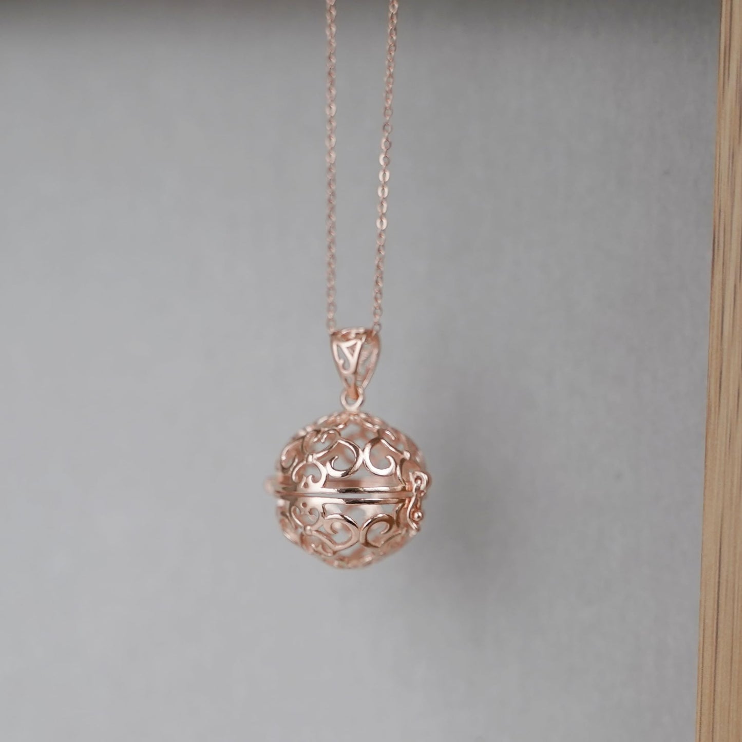 3-Tone Mixed Link Chain with rose-gold tone round locket charm and slim links