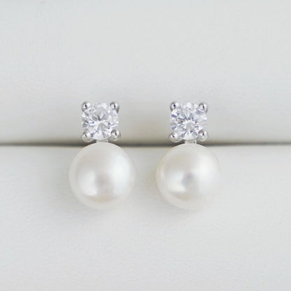 Freshwater Pearl & CZ studs: round CZ center with white pearl drop on posts