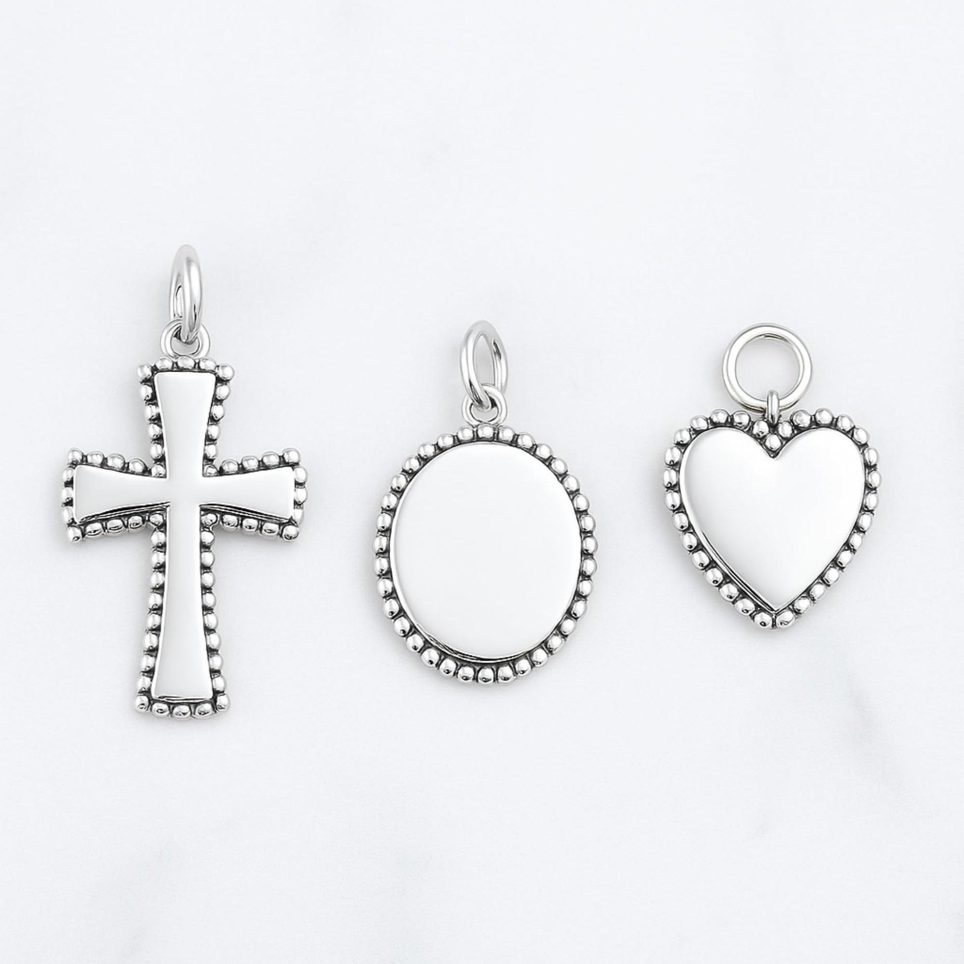 Heart charm pendant with beaded border and ring loop, silver tone