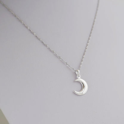 Rhodium twisted chain with crescent moon charm