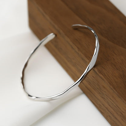 Hammered rhodium silver cuff bracelet, glossy curved open edge