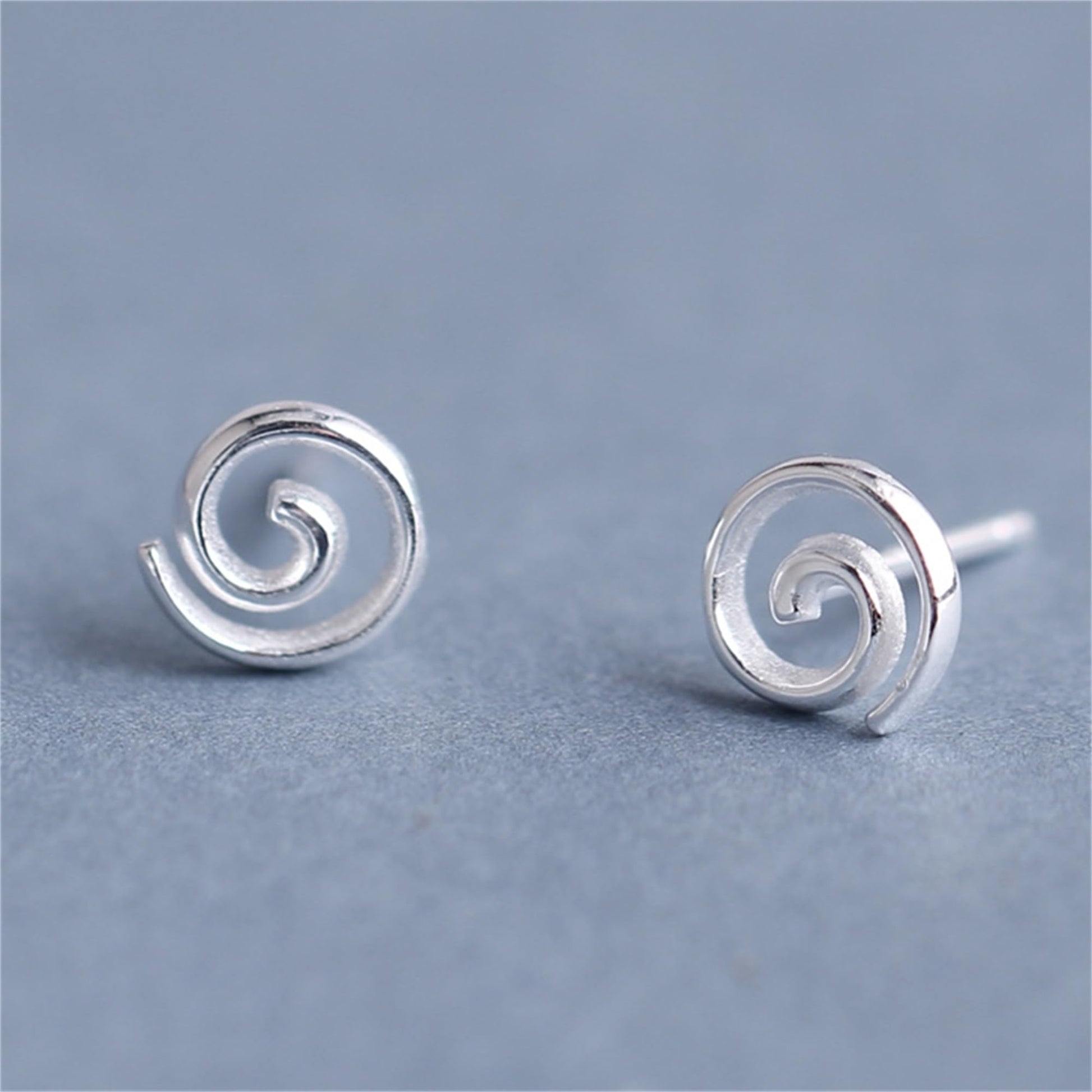 Spiral Swirl Studs, close-up of silver spiral swirl stud with post backing