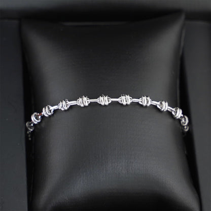 Silver-tone oval rope curb bracelet with repeating oval link segments