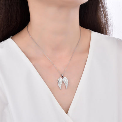 Sterling Silver Angel Feather Wing Earrings & Pendant Set with Paved CZ Stone