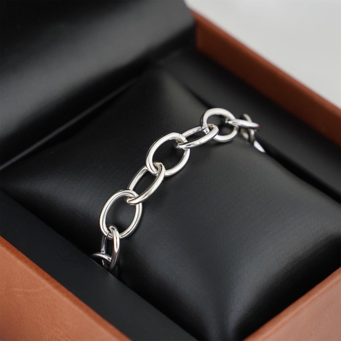 Oxidised linked bracelet with oval links and circular ring clasp