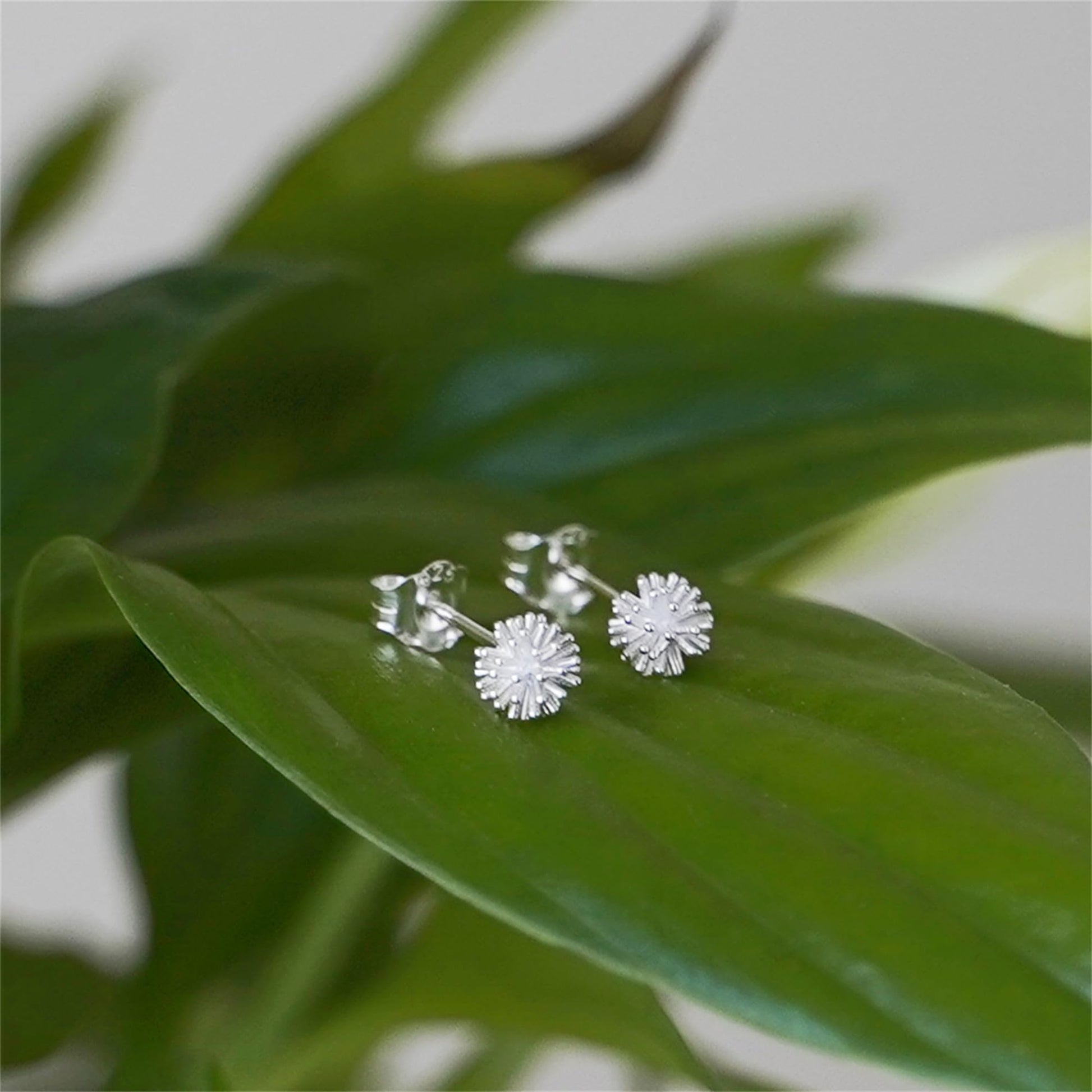 Dandelion flower stud earrings, silver-tone crystals set in flower-burst pattern