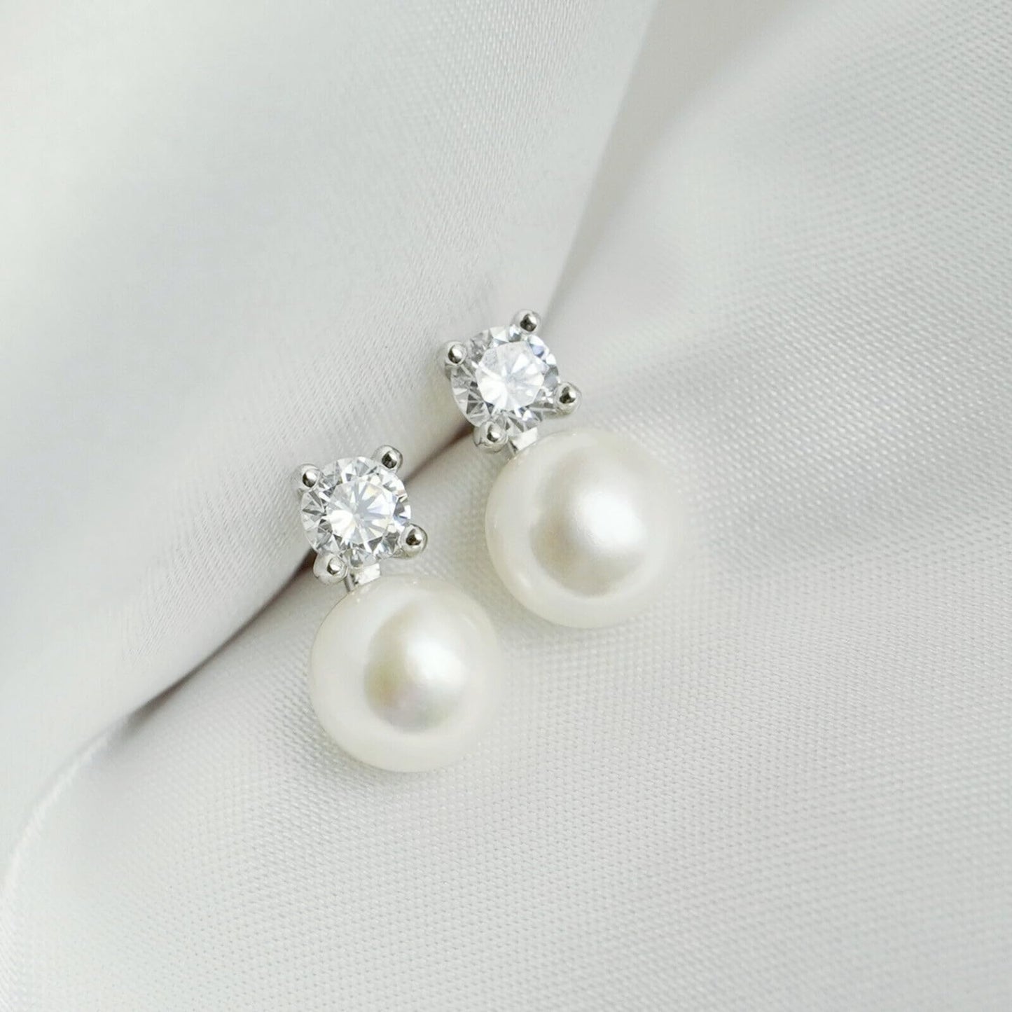 Freshwater Pearl & CZ studs with white round pearls and round CZ clusters on posts
