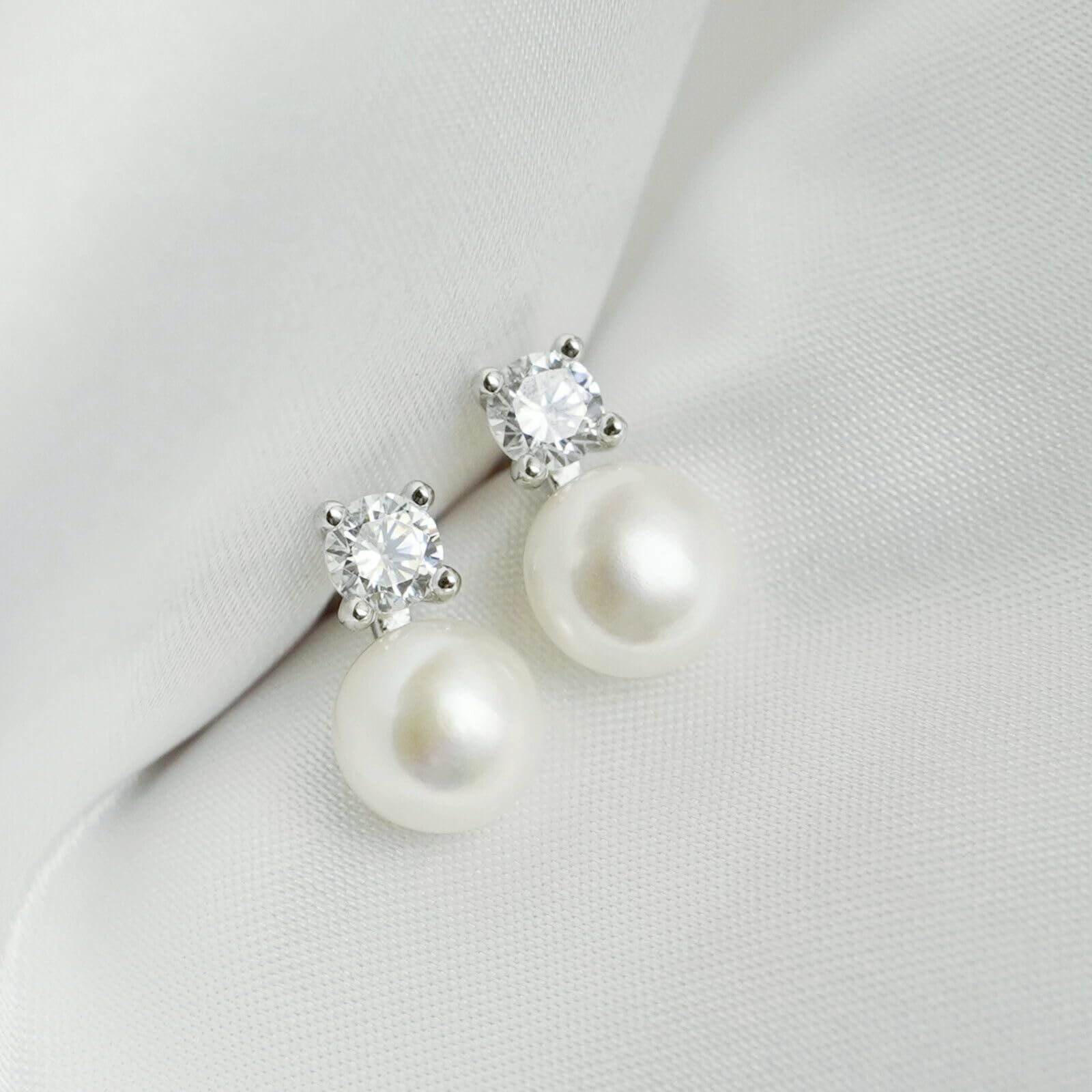Freshwater Pearl & CZ studs with white round pearls and round CZ clusters on posts