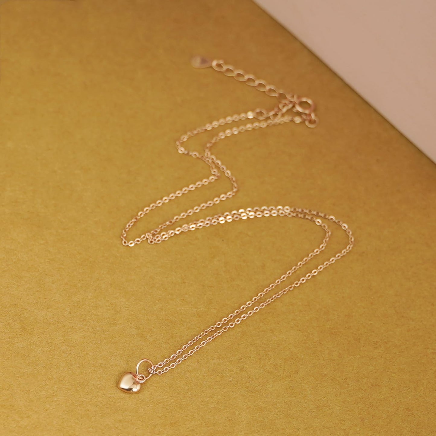 3-Tone Mixed Link Chain in rose gold tone with heart charm at the clasp