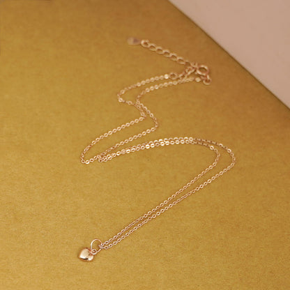 3-Tone Mixed Link Chain in rose gold tone with heart charm at the clasp