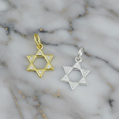 Star of David pendants pair: gold-tone and silver-tone hexagrams with stone accents