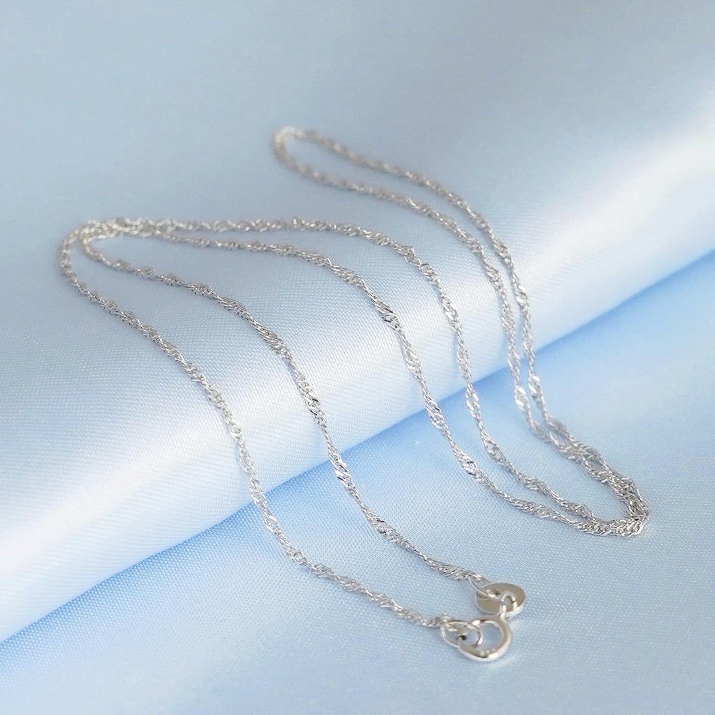 Rhodium twisted chain strands with two small clasp ends